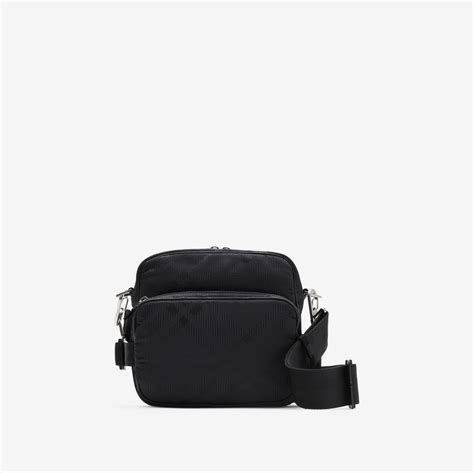 Check Jacquard Pocket Crossbody Bag in Black .